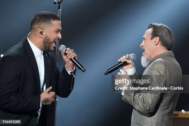 Singer Slimane Nebchi and Florent Pagny perform during the 33rd "Les Victoires De La Musique" at La Seine Musicale on February 9, 2018 in...