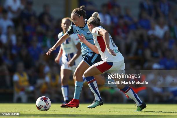 Caitlin Foord of Sydney FC takes on Cassidy Davis of Newcastle Jets during the W-League semi final match between Sydney FC and the Newcastle Jets at...