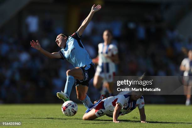 Lisa De Vanna of Sydney FC is tackled by Hannah Brewer of Newcastle Jets who received a red card for challenge during the W-League semi final match...