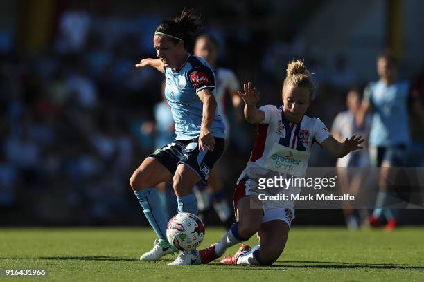 Lisa De Vanna of Sydney FC is tackled by Hannah Brewer of Newcastle Jets who received a red card for challenge during the W-League semi final match...