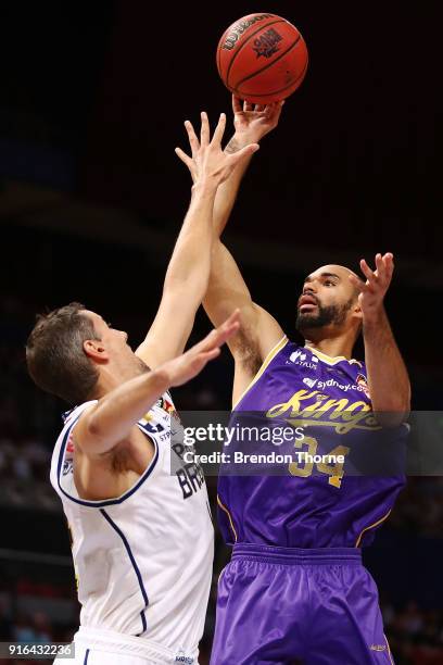 Perry Ellis of the Kings shoots over Adam Gibson of the Bullets during the round 18 NBL match between the Sydney Kings and the Brisbane Bullets at...