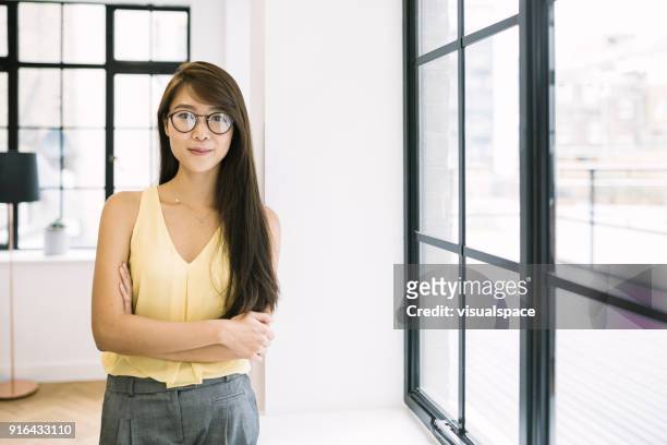 young asian entrepreneur - chinese ethnicity stock pictures, royalty-free photos & images
