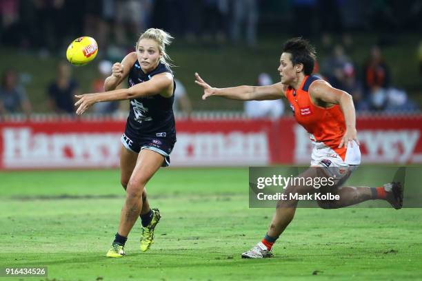 Sarah Hosking of the Blues handballs during the round 20 AFLW match between the Greater Western Sydney Giants and the Carlton Blues at Drummoyne Oval...