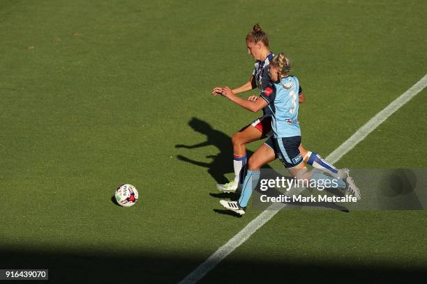 Remy Siemsen of Sydney FC and Natasha Prior of Newcastle Jets compete for the ball during the W-League semi final match between Sydney FC and the...