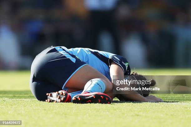 Caitlin Foord of Sydney FC is treated for an injury during the W-League semi final match between Sydney FC and the Newcastle Jets at Leichhardt Oval...