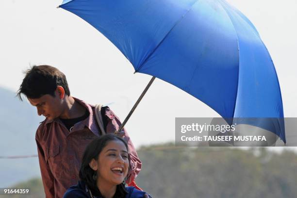 Bollywood actress Manisha Koirala is seen on location during the filming of "Meghna" under tight security cover in Srinagar on October 9, 2009....