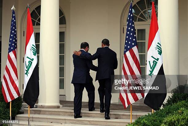 President Barack Obama and Iraqi Prime Minister Nuri al-Maliki leave after giving a joint press conference following their meeting at the Rose Garden...