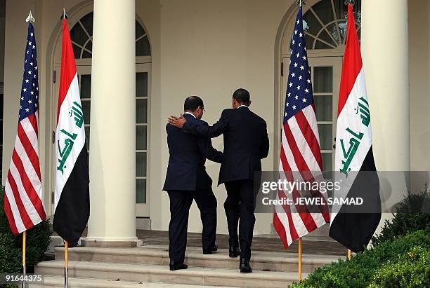 President Barack Obama and Iraqi Prime Minister Nuri al-Maliki leave after giving a joint press conference following their meeting at the Rose Garden...