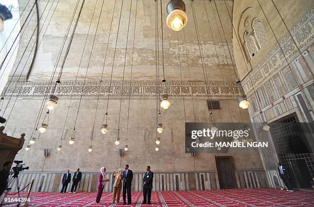 President Barack Obama and US Secretary of State Hillary Clinton tour the Sultan Hassan Mosque in Cairo on June 4, 2009. Obama took a tour of the...