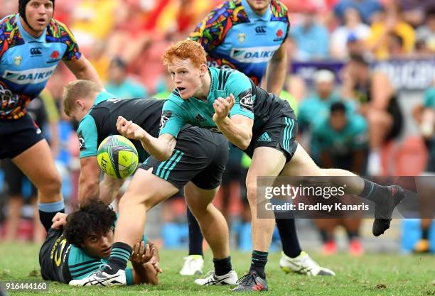 Finlay Christie of the Hurricanes passes the ball during the 2018 Global Tens match between the New South Wales Waratahs and Hurricanes at Suncorp...