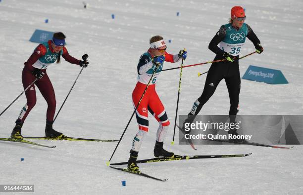 Anastasia Sedova of Olympic Athlete from Russia, Ragnhild Haga of Norway and Victoria Carl of Germany compete during the Ladies Cross Country Skiing...