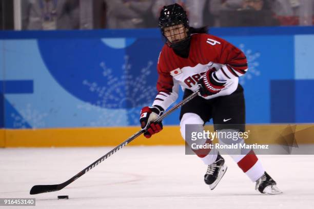 Ayaka Toko of Japan controls the puck against Sweden during the Women's Ice Hockey Preliminary Round - Group B game on day one of the PyeongChang...