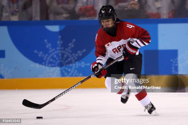 Ayaka Toko of Japan controls the puck against Sweden during the Women's Ice Hockey Preliminary Round - Group B game on day one of the PyeongChang...