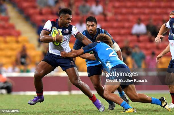 Samu Kerevi of the Reds breaks away from the defence during the 2018 Global Tens match between the Queensland Reds and Blues at Suncorp Stadium on...