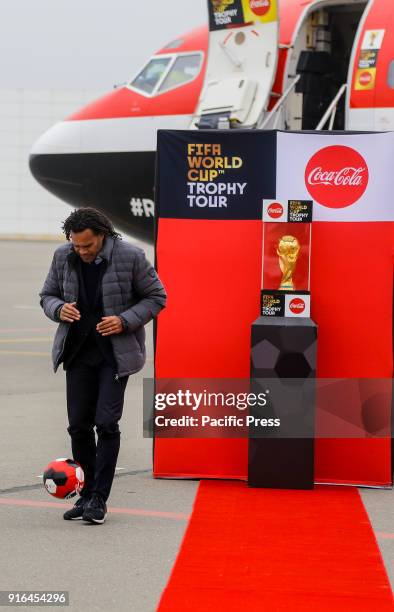 Christian Karembeu performs during the FIFA World Cup Trophy Tour presented by Coca-Cola at Heydar Aliyev Airport.