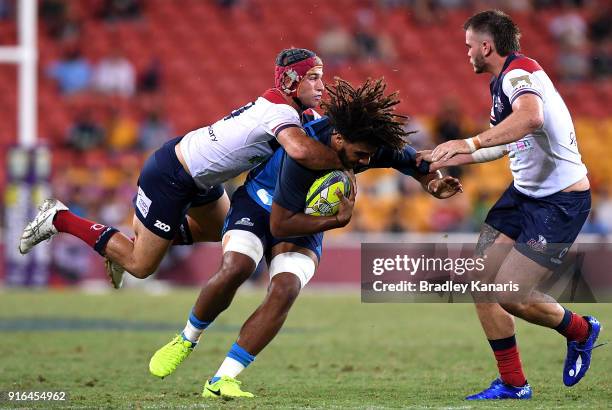 Hoskins Sotutu of the Blues takes on the defence during the 2018 Global Tens match between the Blues and Queensland Reds at Suncorp Stadium on...