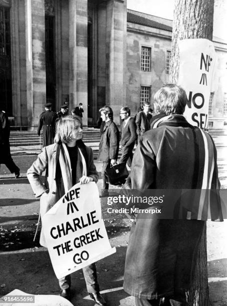 Wales Nationalist demonstrators outside the Temple of Peace with placards, before the arrival of Lord Snowdon. Cardiff, 17th November 1967.