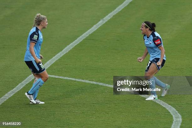 Lisa De Vanna of Sydney FC and Remy Siemsen of Sydney FC celebrate victory at the end of the W-League semi final match between Sydney FC and the...