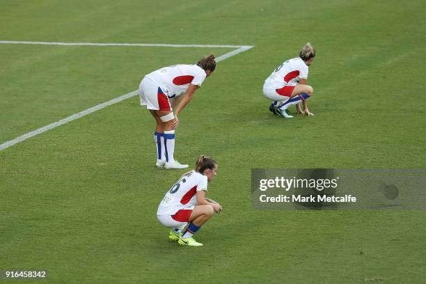 Newcastle Jets players look dejected after defeat in the W-League semi final match between Sydney FC and the Newcastle Jets at Leichhardt Oval on...