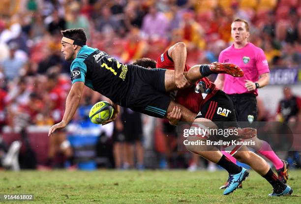 Sam Henwood of the Hurricanes is picked up in the tackle by Heiden Bedwell-Curtis of the Crusaders during the 2018 Global Tens semi-final match...