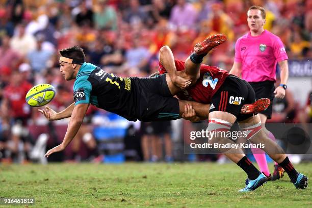 Sam Henwood of the Hurricanes is picked up in the tackle by Heiden Bedwell-Curtis of the Crusaders during the 2018 Global Tens semi-final match...