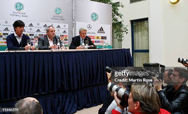 Head coach Joachim Loew and press officer Harald Stenger of Germany attends the German National Team press conference at the Kempinski Baltschug...