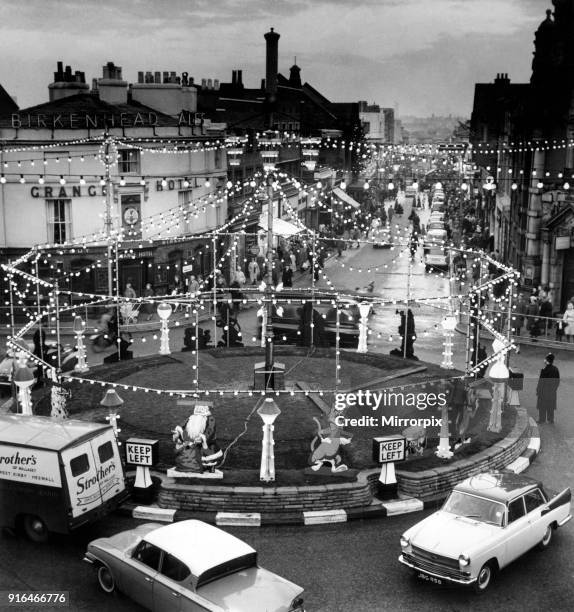 Showpiece of the Birkenhead illuminations, a traffic island in Grange Road with hundreds of lights and animals. Wirral, Merseyside, 30th November...