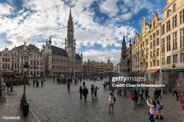 grand place and town hall, brussels, belgium - panorama brussels stock pictures, royalty-free photos & images