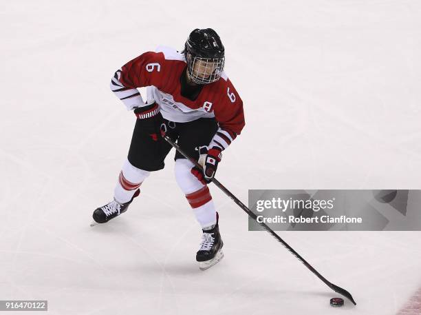 Sena Suzuki of Japan controls the puck during the Women's Ice Hockey Preliminary Round, Group B match between Japan and Sweden on day one of the...