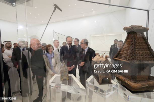 French Prime Minister Edouard Philippe tours the Louvre Abu Dhabi Museum on February 10 on Saadiyat island in the Emirati capital, to launch the...