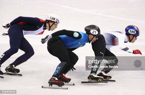 Hyojun Lim of Korea, Denis Nikisha of Kazakhstan and Sebastien Lepape of France compete during the Men's 1500m Short Track Speed Skating qualifying...