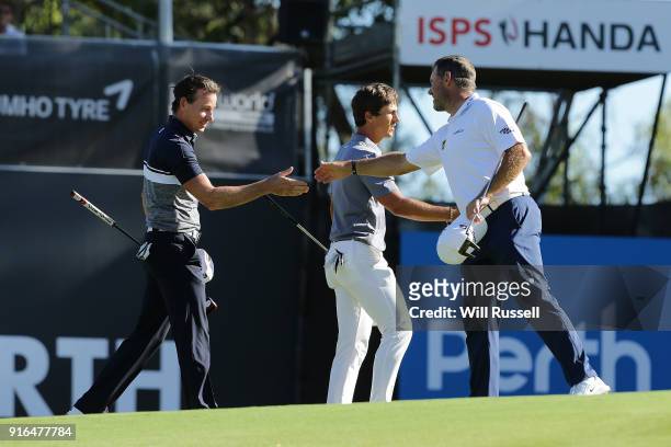 Brett Rumford of Australia and Lee Westwood of England shake hands after completing the round during day three of the World Super 6 at Lake Karrinyup...