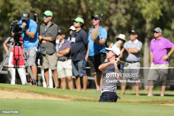 Brett Rumford of Australia plays a bunker shot on the 14th hole during day three of the World Super 6 at Lake Karrinyup Country Club on February 10,...
