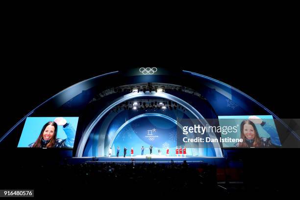 General view as gold medalist Charlotte Kalla of Sweden is seen on the video screen during the Medal Ceremony for the Cross-Country Skiing Ladies'...