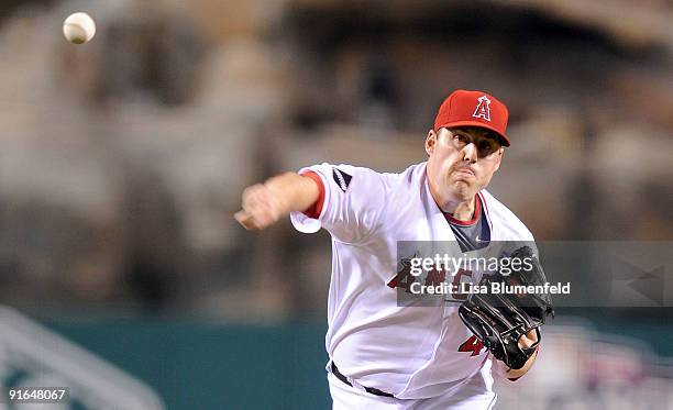 Starting pitcher John Lackey of the Los Angeles Angels of Anaheim delivers a pitch against the Boston Red Sox during Game One of the ALDS during the...