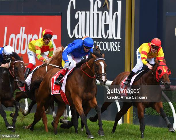 Craig Williams riding Hartnell defeats John Allen riding Brave Smash and Mark Zahra riding Thronum in Race 8, Ladbrokes C.F Orr Stakes during...