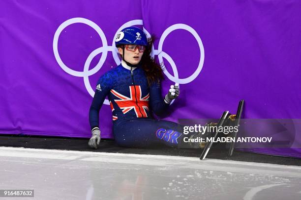 Britain's Kathryn Thomson reacts after crashing in the women's 500m short track speed skating heat event during the Pyeongchang 2018 Winter Olympic...