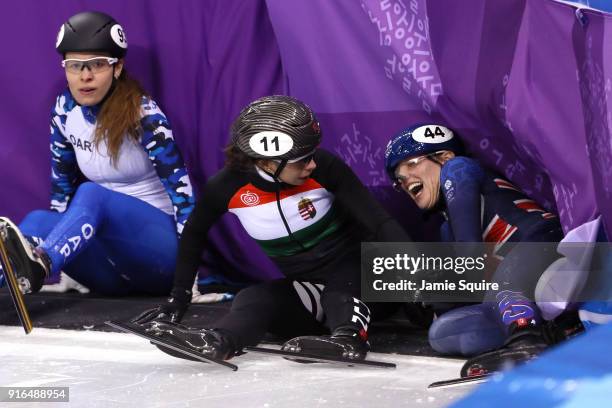 Emina Malagich of Olympic Athlete from Russia, Petra Jaszapati of Hungary and Charlotte Gilmartin of Great Britain crash during the Ladies 500m...