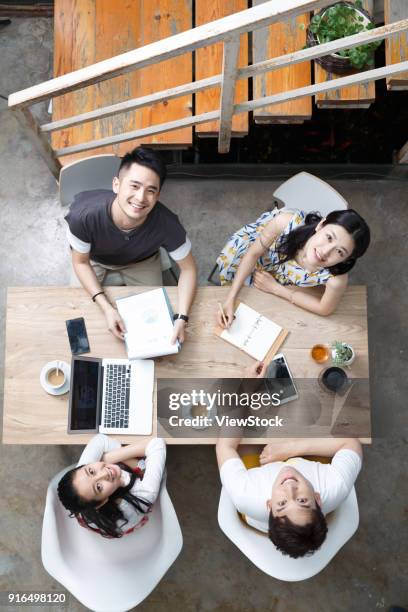 young people work in a studio - design studio woman chinese laptop fotografías e imágenes de stock