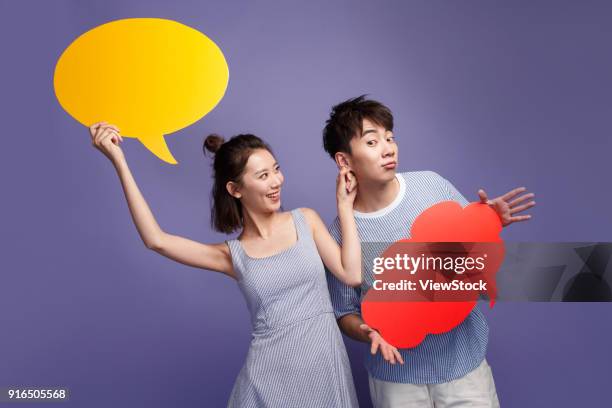 young men and women fashion mischief - bossy girlfriend stock pictures, royalty-free photos & images