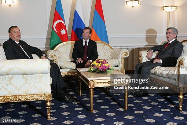 Azerbaijan's President Ilham Aliyev, Russian President Dmitry Medvedev and Armenia's President Serg Sargsyan attend a plenary meeting of the...