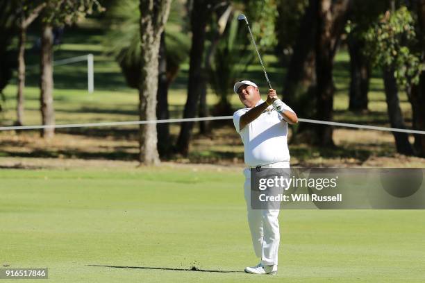 Prom Meesawat of Thailand plays his second shot on the 14th hole during day three of the World Super 6 at Lake Karrinyup Country Club on February 10,...