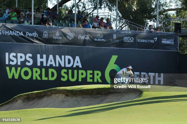 Kiradech Aphibarnrat of Thailand lines up putt on the 2nd play off knockout 18th hole during day three of the World Super 6 at Lake Karrinyup Country...