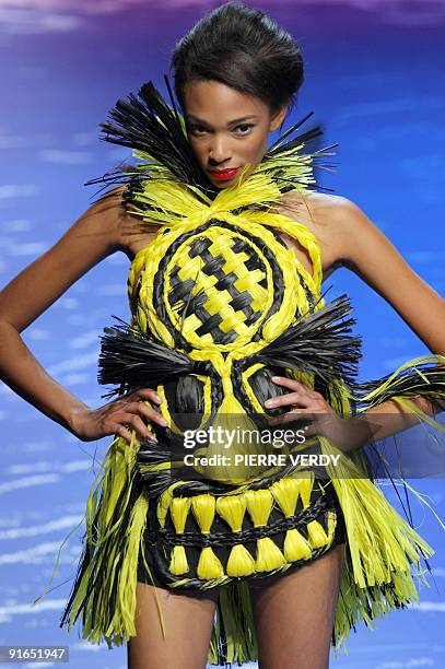 Model presents an outfit by French designer Jean-Charles de Castelbajac during ready-to-wear Spring-Summer 2010 fashion show on October 6, 2009 in...