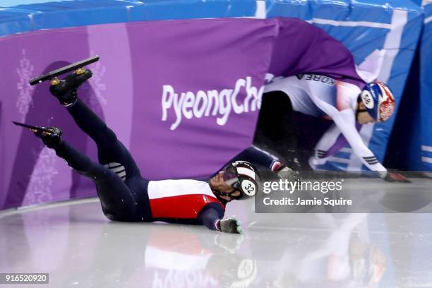 Thibaut Fauconnet of France and Daeheon Hwang of Korea crash during the Men's 1500m Short Track Speed Skating final on day one of the PyeongChang...