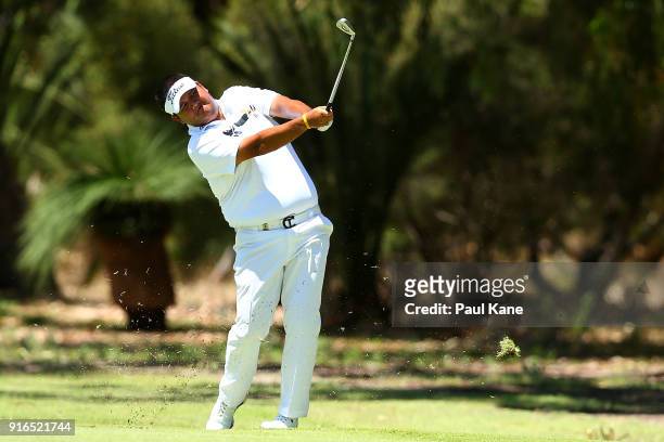 Prom Meesawat of Thailand plays his second shot on the 4th hole during day three of the World Super 6 at Lake Karrinyup Country Club on February 10,...