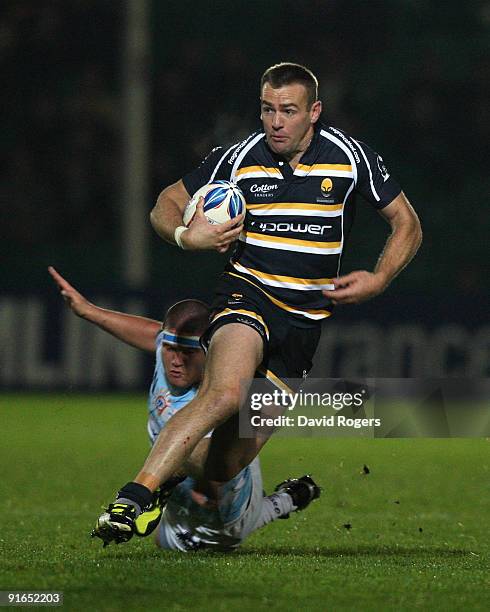 Chris Latham of Worcester moves away from Kevin Kervarec during the Amlin Challenge Cup match between Worcester Warriors and Montpellier at Sixways...