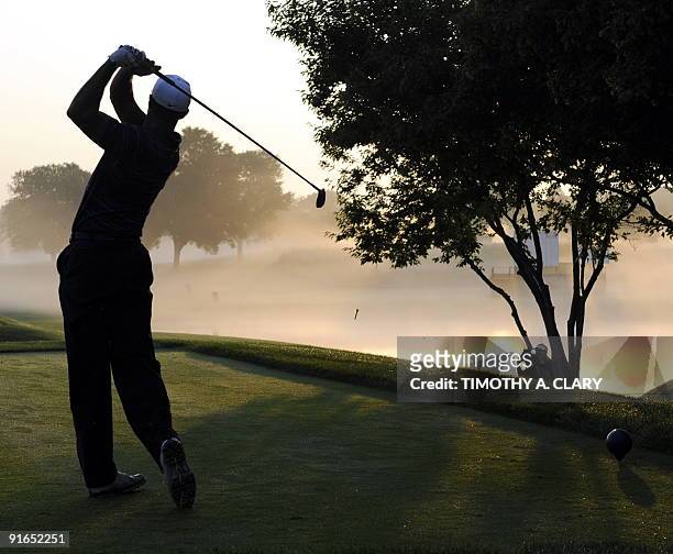 Tiger Woods of the US swings during a practice round August 11 , 2009 at the 91st PGA Championship at the Hazeltine National Golf Club in Chaska,...
