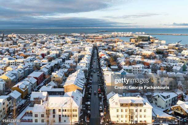 view of reykjavik from hallgrimskirkja - reykjavik hallgrimskirkja stock pictures, royalty-free photos & images