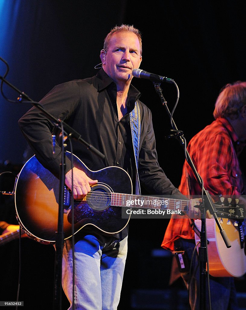 Kevin Costner & Modern West Heavy Like The Rain Kevin Costner performs with his band Kevin Costner & Modern West at